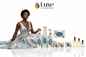Floral Daydream — 9-Piece Lineup, Black Female Model Sky Blue Gold Floral Gown Seated Left